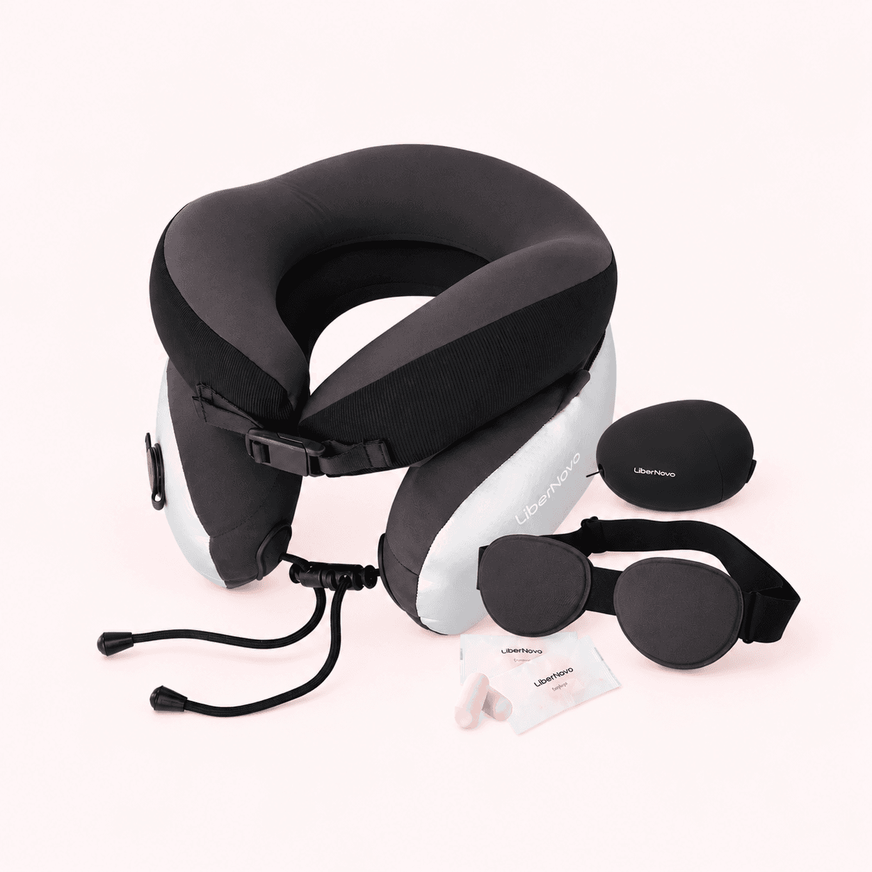 LiberNovo travel accessory kit against a pale pink background